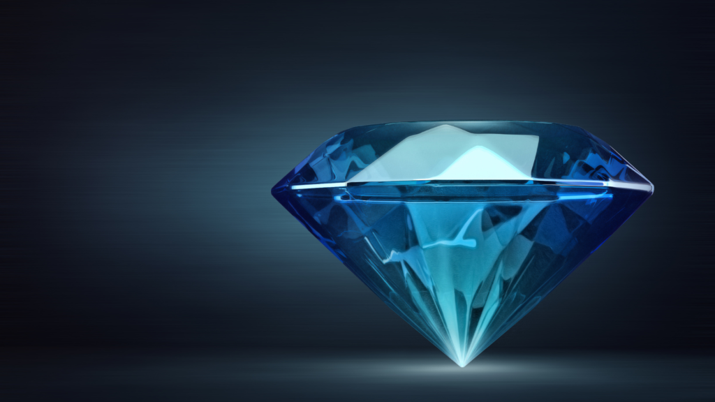 A brilliant blue diamond displayed against a dark gradient background, showcasing its deep color and faceted brilliance.